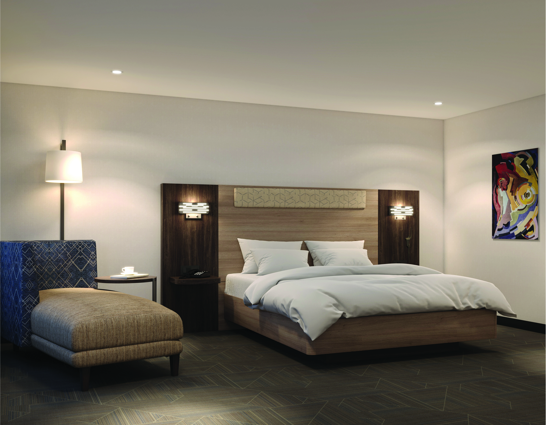 Hotel guest room with custom wood headboard and lighting